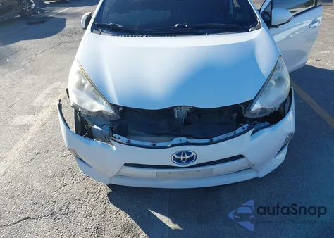2013 Toyota Prius C Two z USA, uszkodzony, nr VIN JTDKDTB3XD1543782